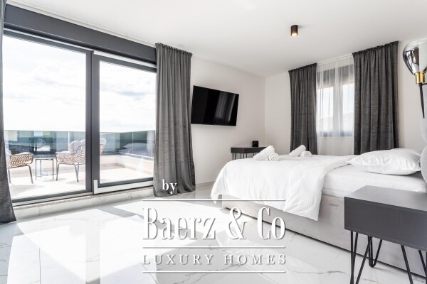 photo 12 Seget, a contemporary villa with an open sea view