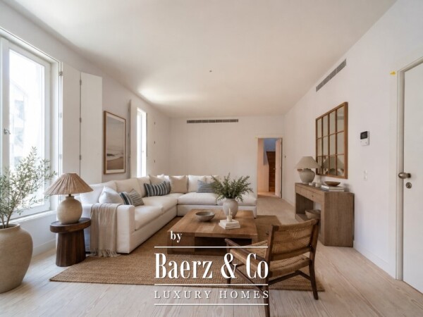 photo 1 Three-Bedroom Duplex with Balcony, Two Parking Spaces, and Storage Room
