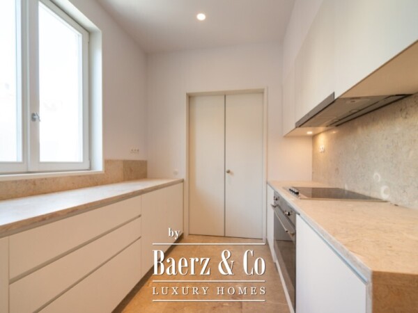 photo 8 Three-Bedroom Duplex with Balcony, Two Parking Spaces, and Storage Room