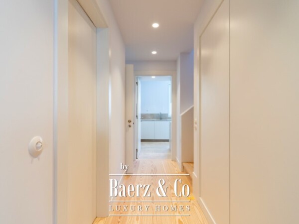 photo 10 Three-Bedroom Duplex with Balcony, Two Parking Spaces, and Storage Room