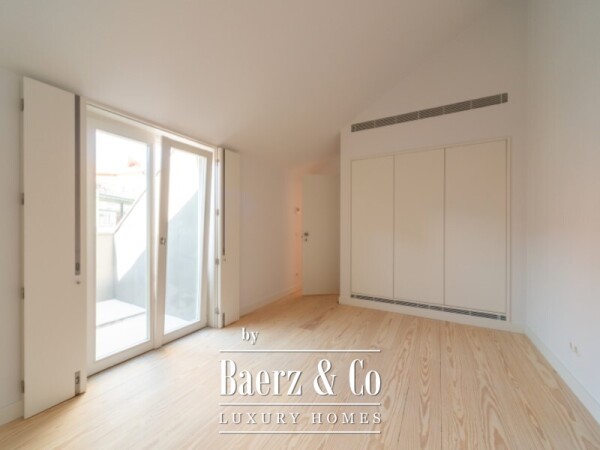 photo 18 Three-Bedroom Duplex with Balcony, Two Parking Spaces, and Storage Room